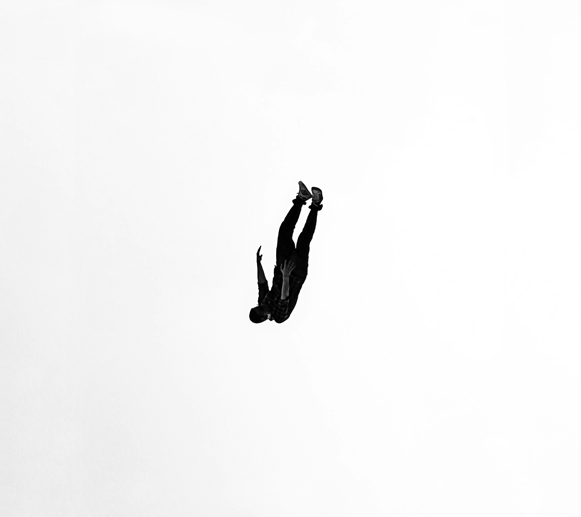 Man falling on a white background. 